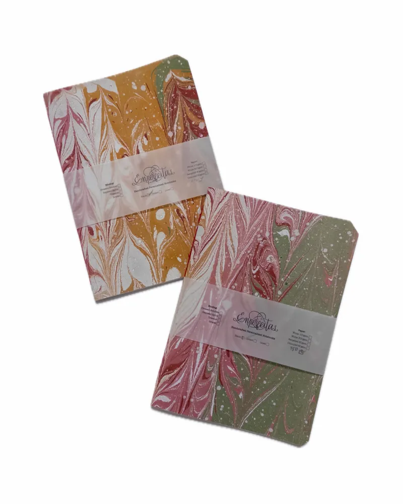 Marbled notebooks in yellow and red